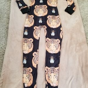 One piece pajama for women. Large print, deep V-neck, Snap back with functional